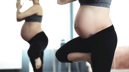 pregnant women doing yoga