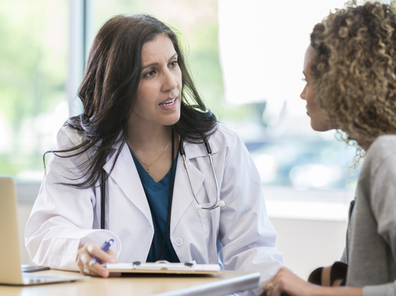 lady doctor consult a women for menopause