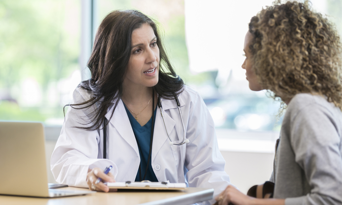 lady doctor consult a women for menopause