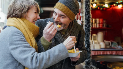 couple eating food outside