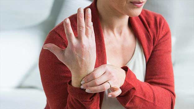 women suffering wrist pain